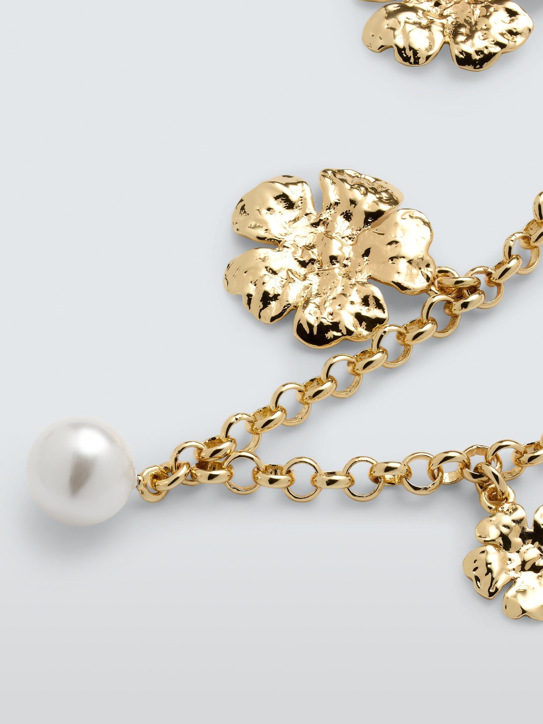 Completedworks x John Lewis gold flower charm bracelet, imported from the UK
