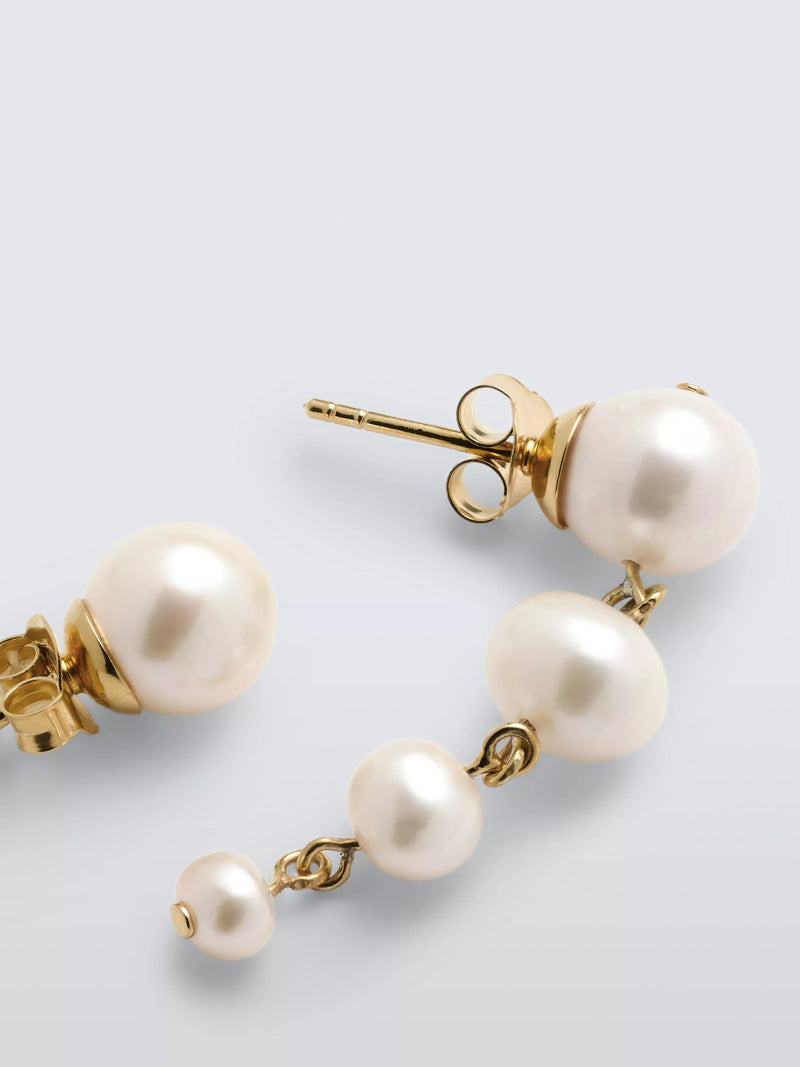 Completedworks mismatch freshwater pearl earrings in gold, imported from the UK