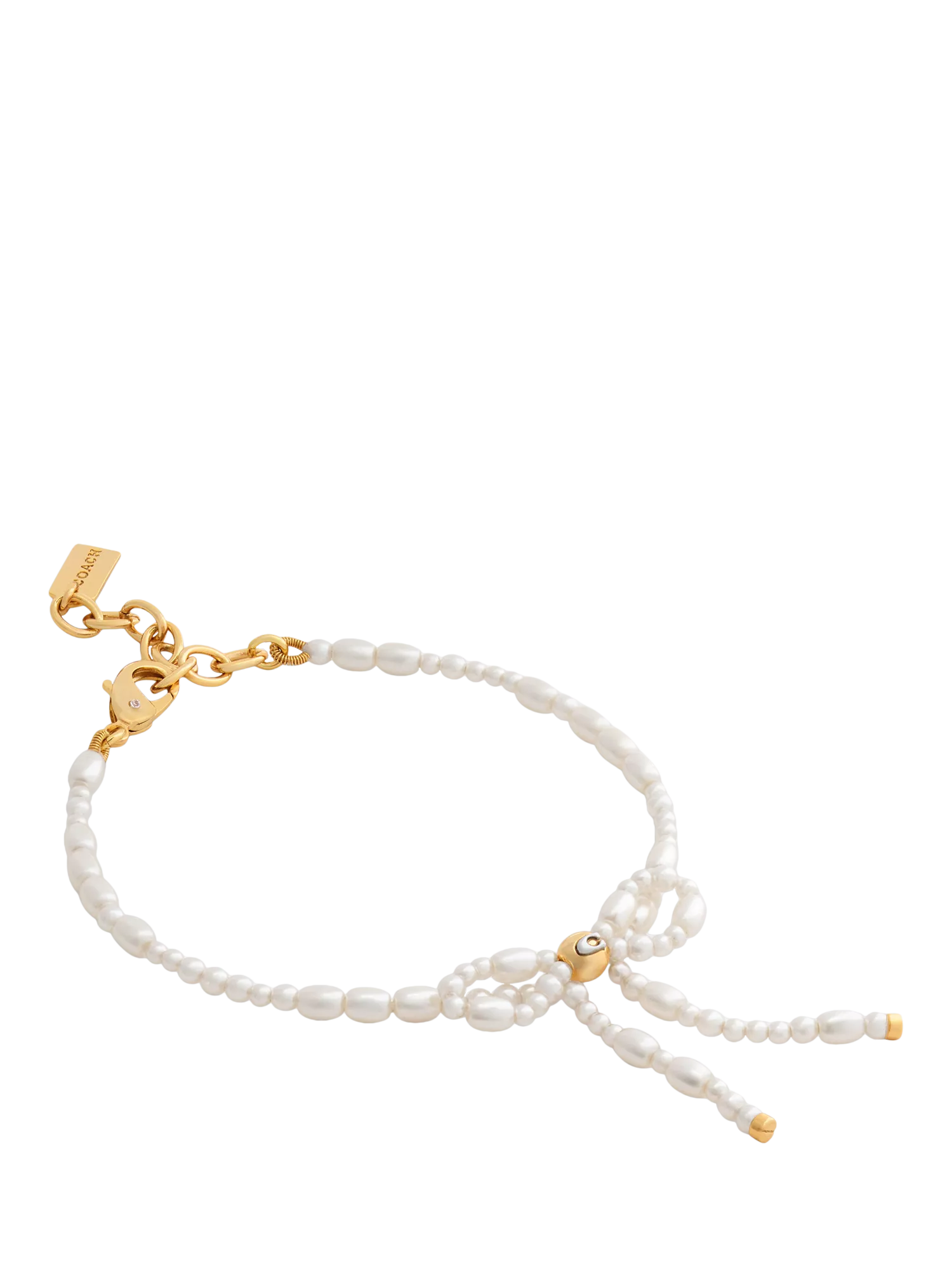 Coach pearl bow bracelet with gold tone accents, UK version