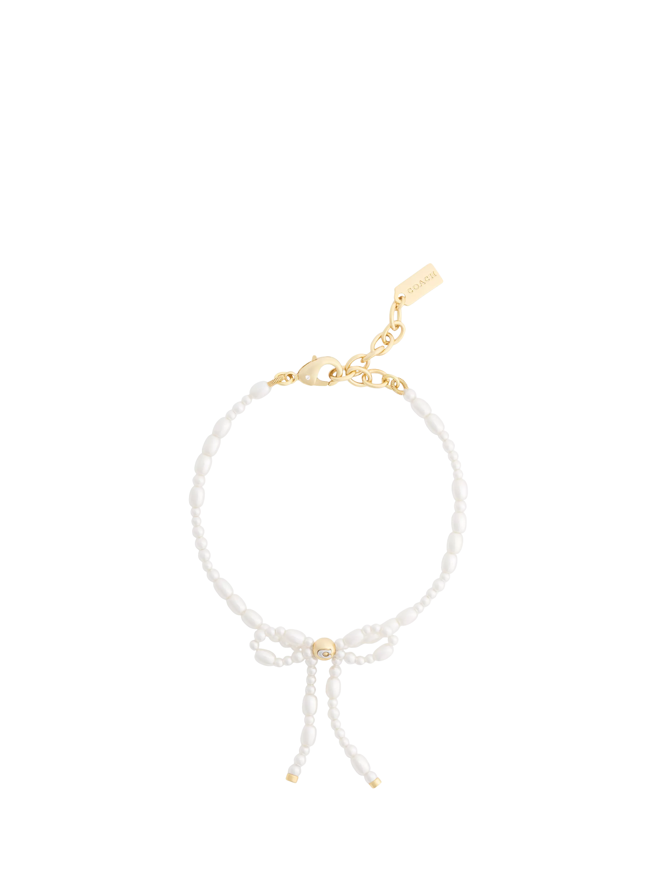 Coach pearl bow bracelet with gold tone accents, UK version