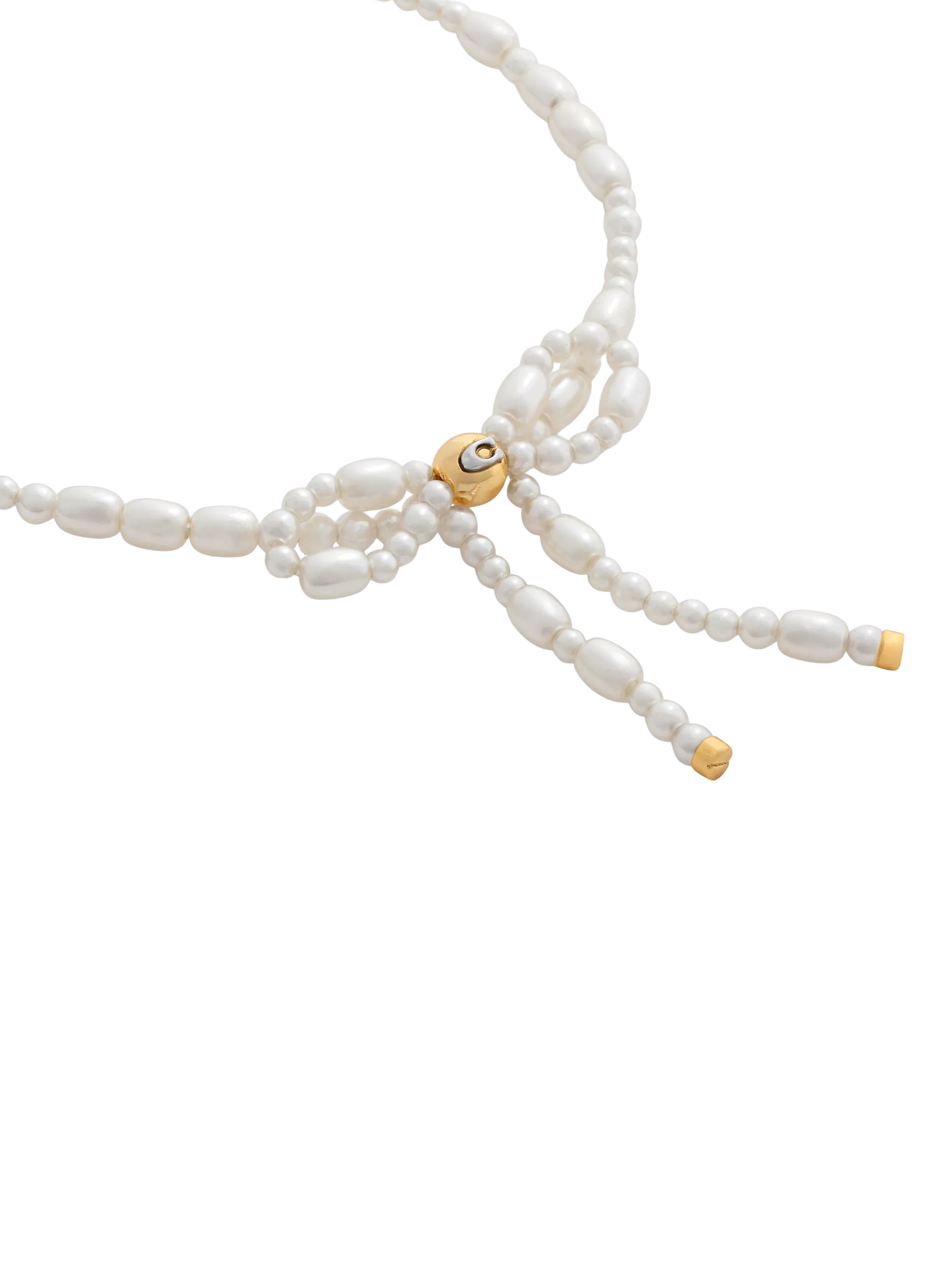 Coach pearl bow bracelet with gold tone accents, UK version