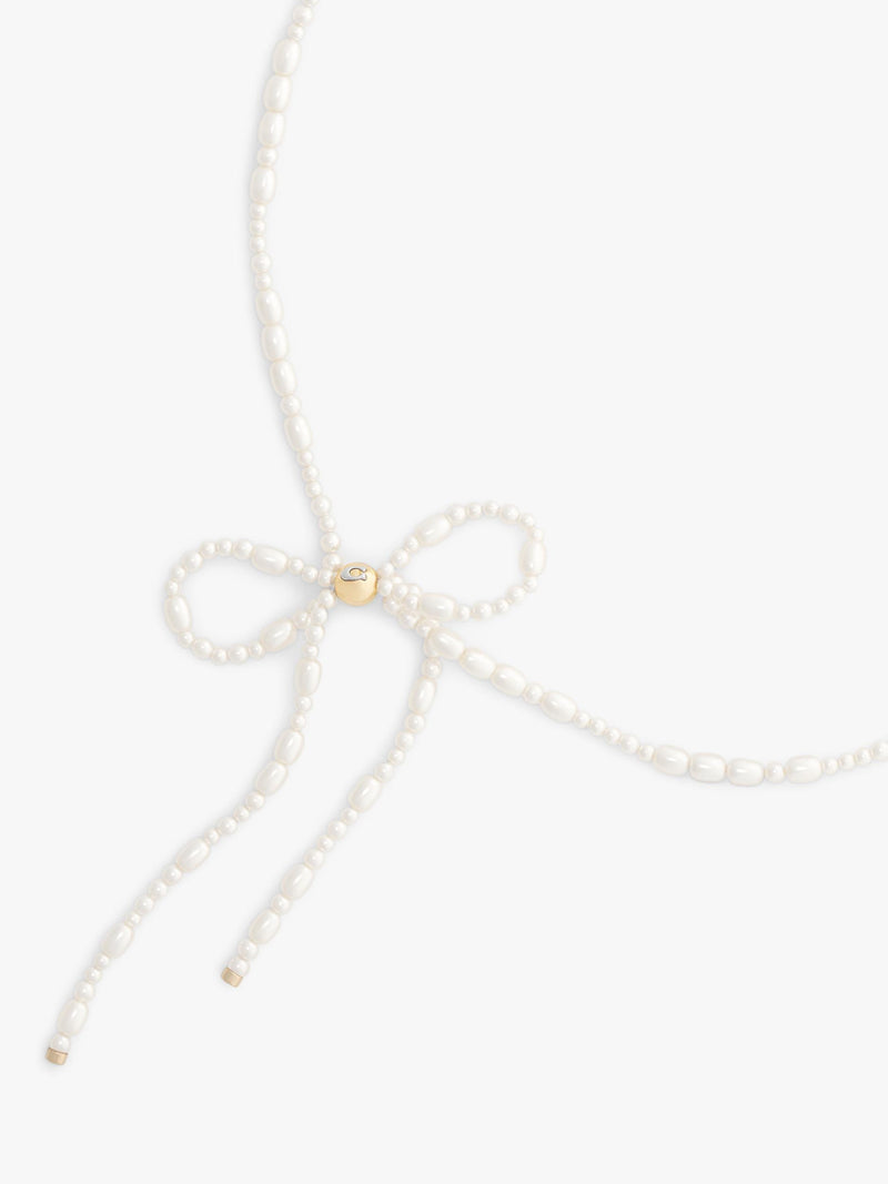 Coach pearl bow choker necklace, imported from the UK