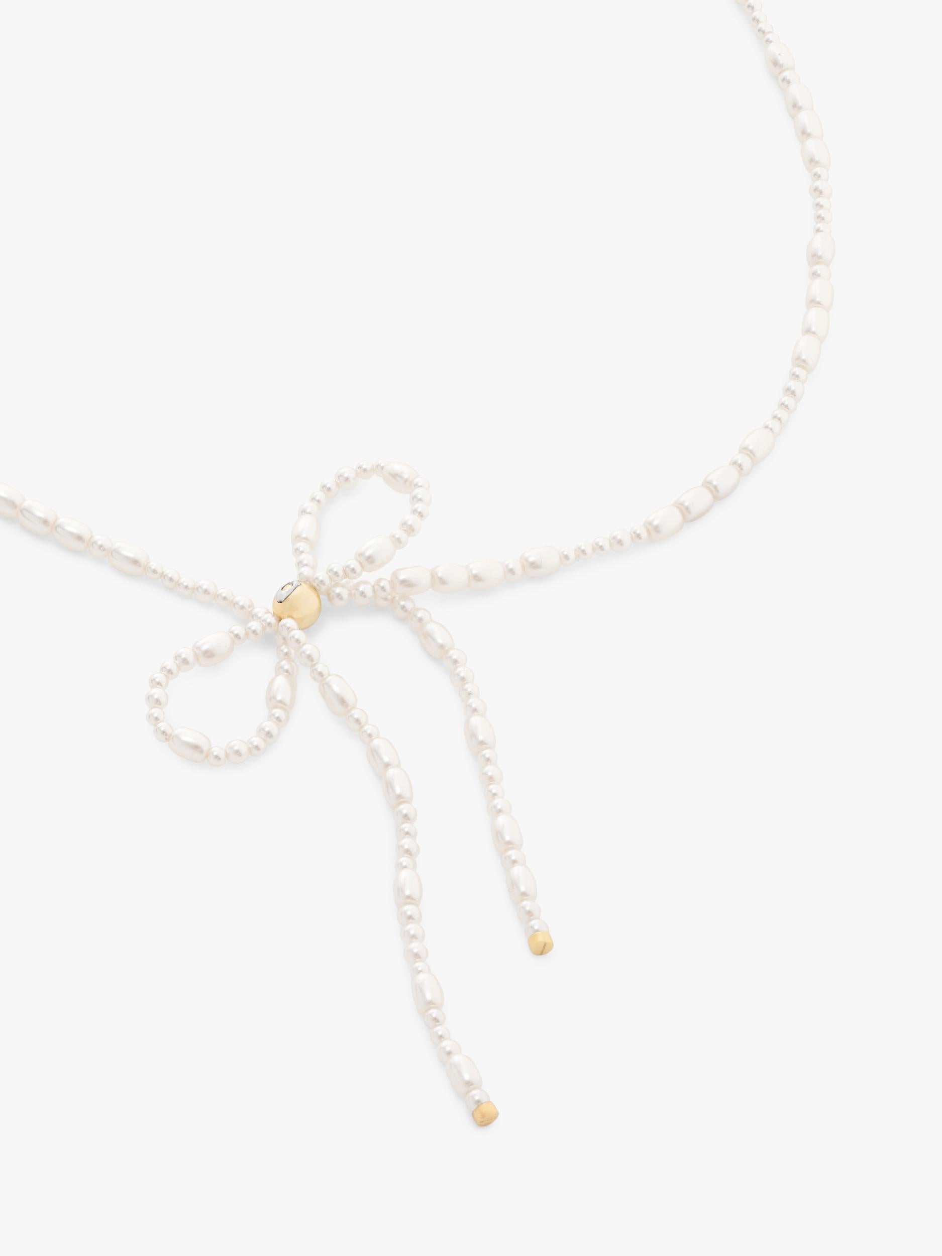 Coach pearl bow choker necklace, imported from the UK