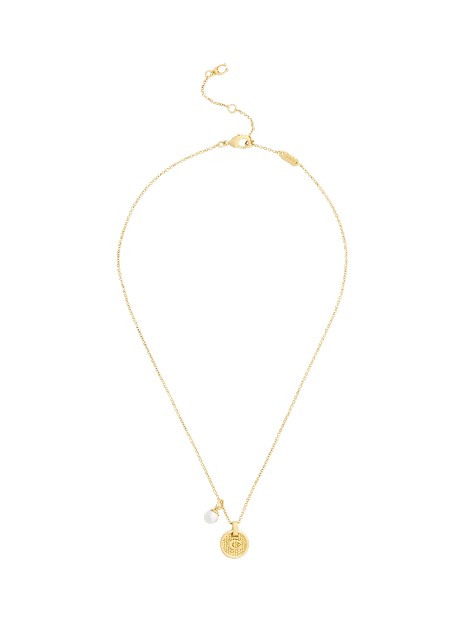 Coach gold-toned disc pendant necklace imported from the UK