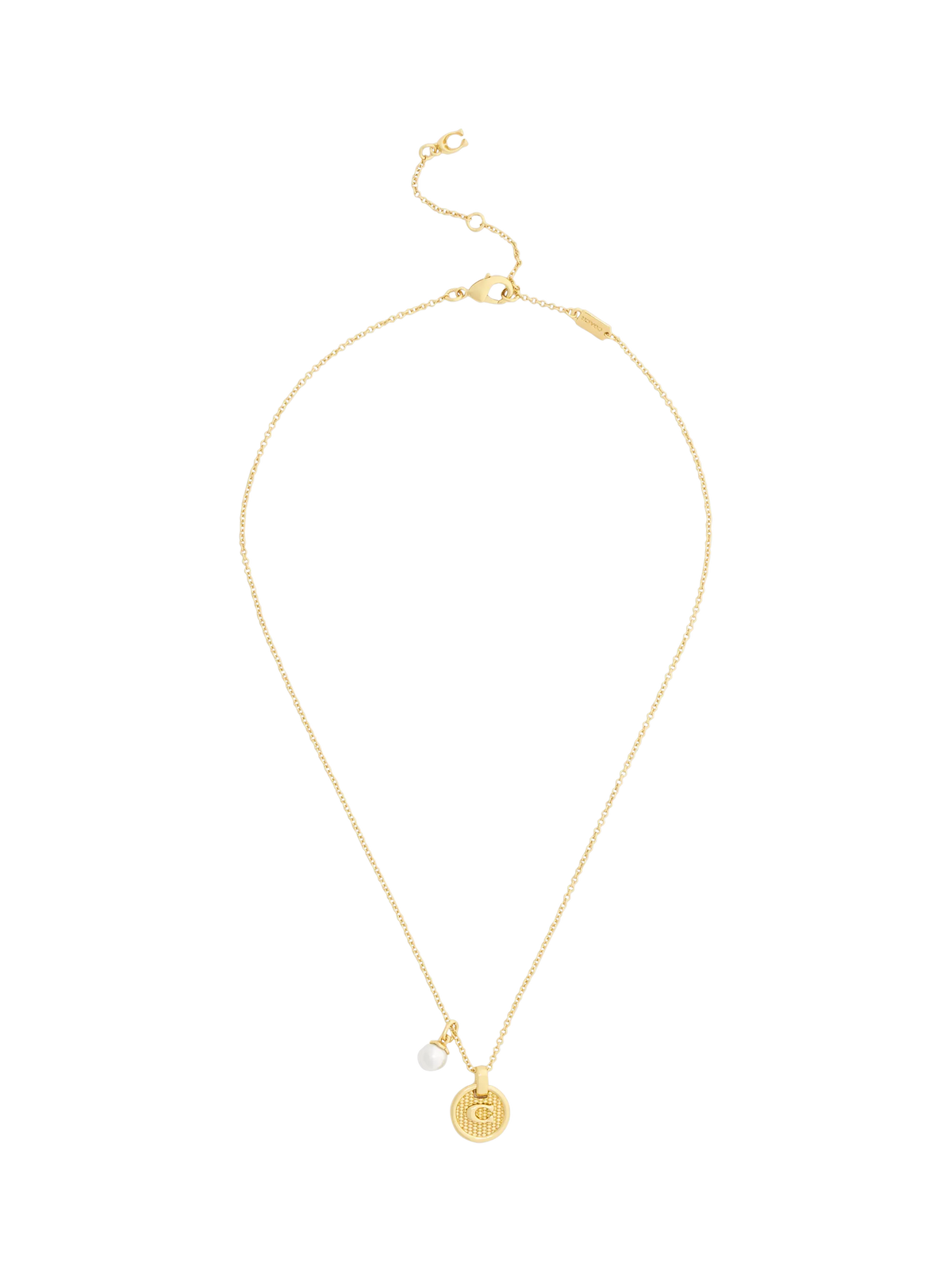 Coach gold-toned disc pendant necklace imported from the UK