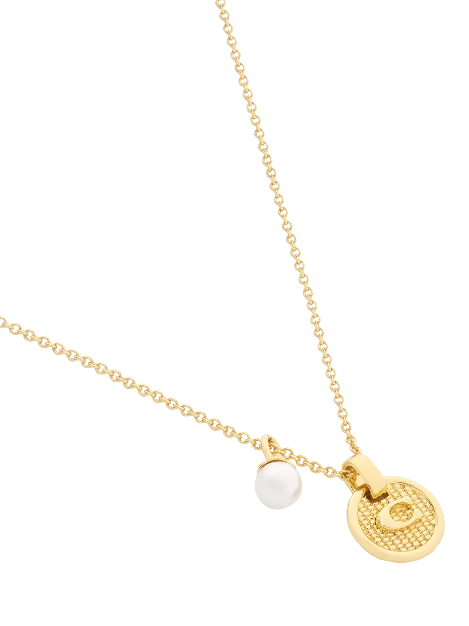 Coach gold-toned disc pendant necklace imported from the UK