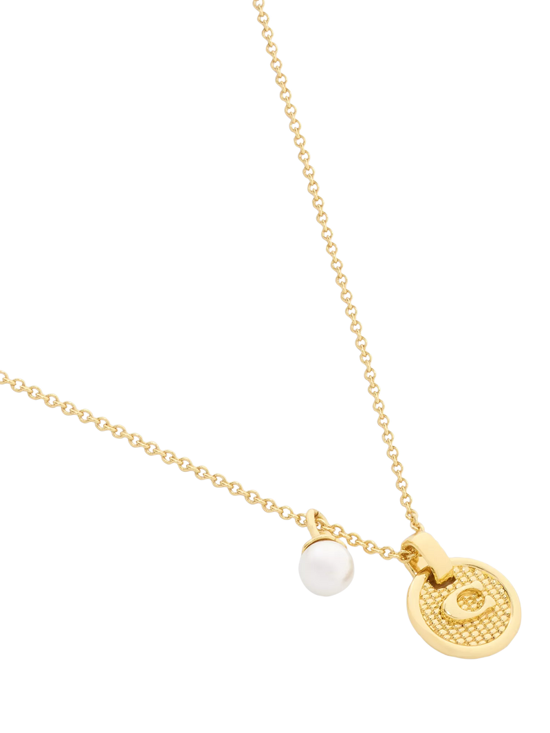 Coach gold-toned disc pendant necklace imported from the UK