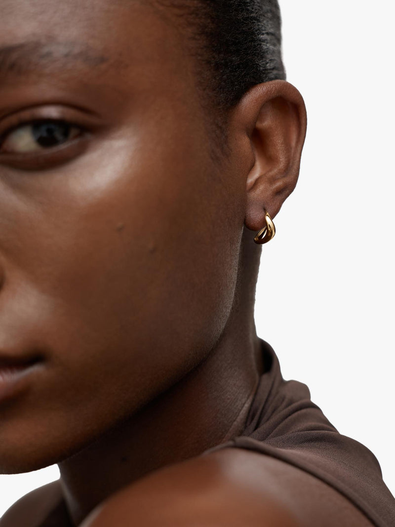 Monica Vinader Swirl Huggie Earrings, imported from the UK