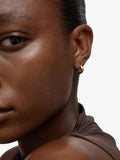 Monica Vinader Swirl Huggie Earrings, imported from the UK