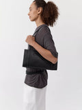 St. Agni minimal black leather pocket bag, UK version