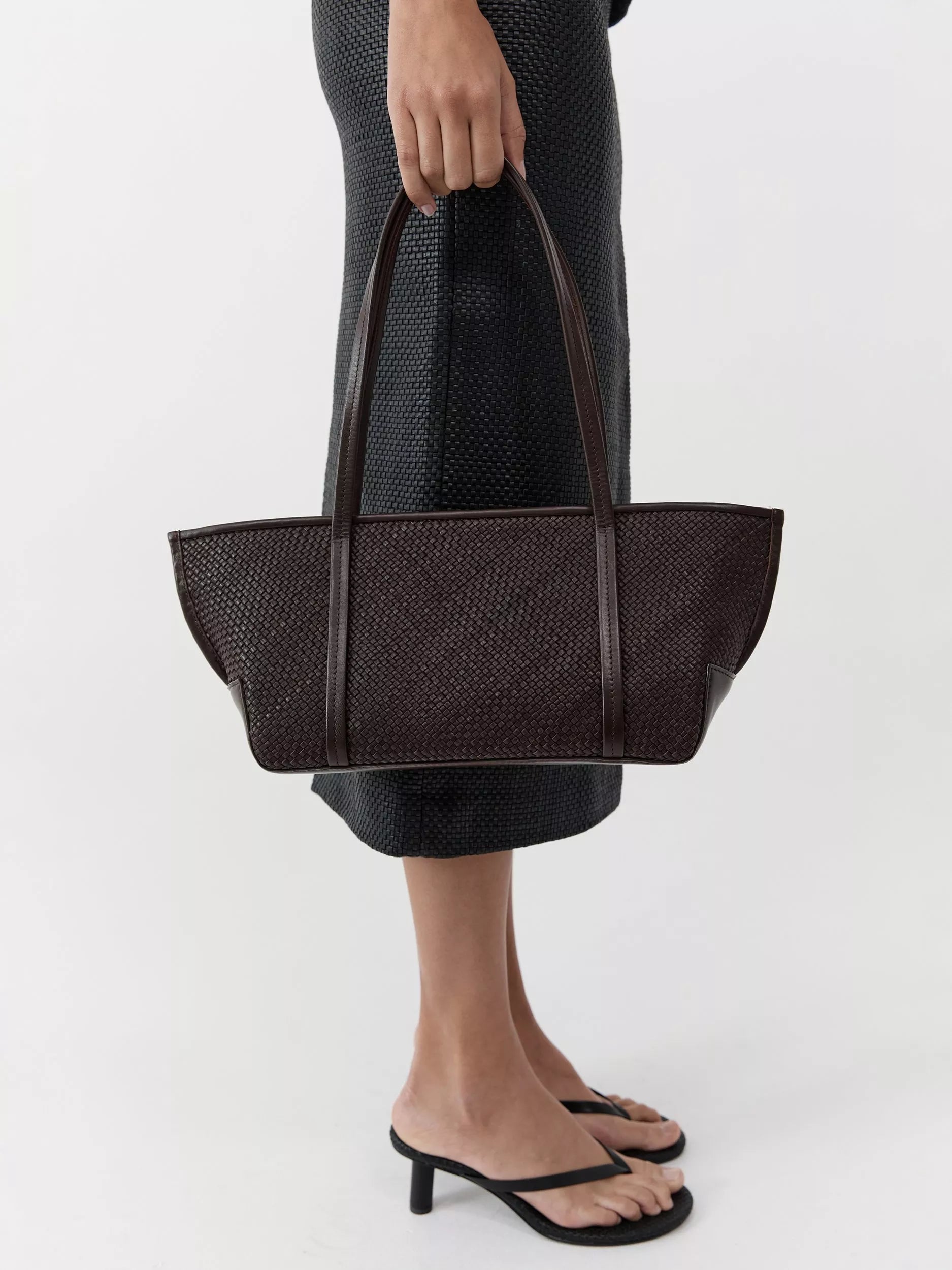 St. Agni woven slim bateau tote bag in coffee, imported from the UK