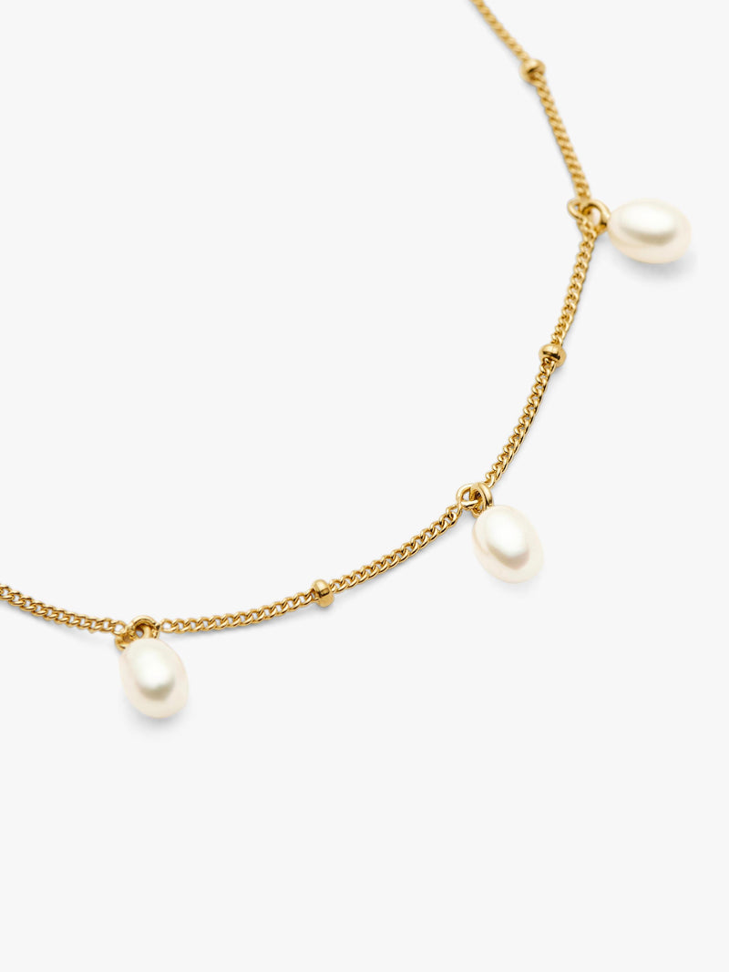 Missoma gold pearl charm bracelet, UK version