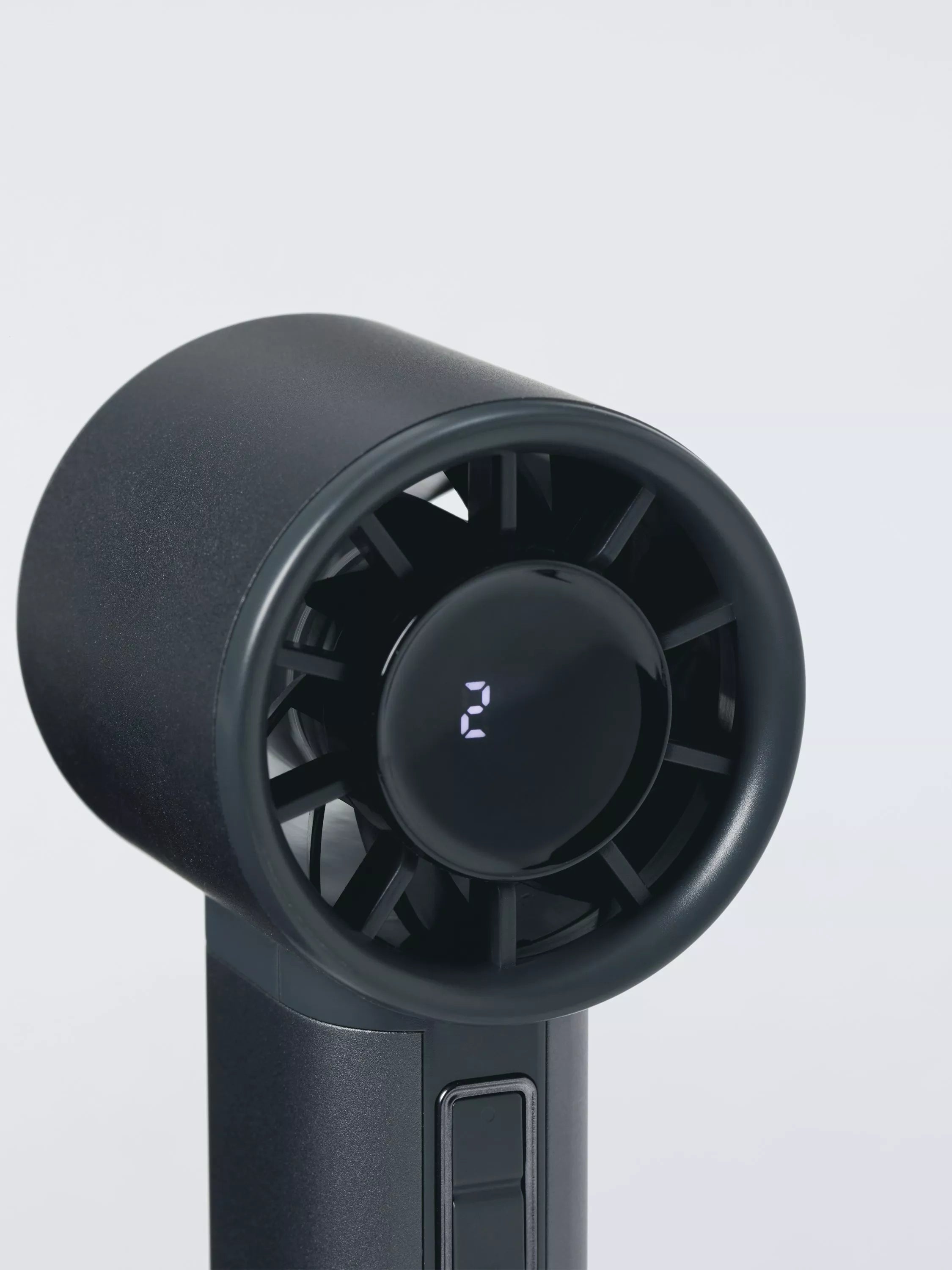 John Lewis handheld fan with aluminium casing, imported from the UK