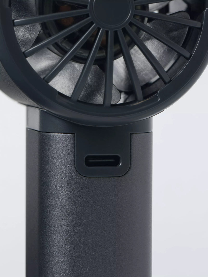 John Lewis handheld fan with aluminium casing, imported from the UK