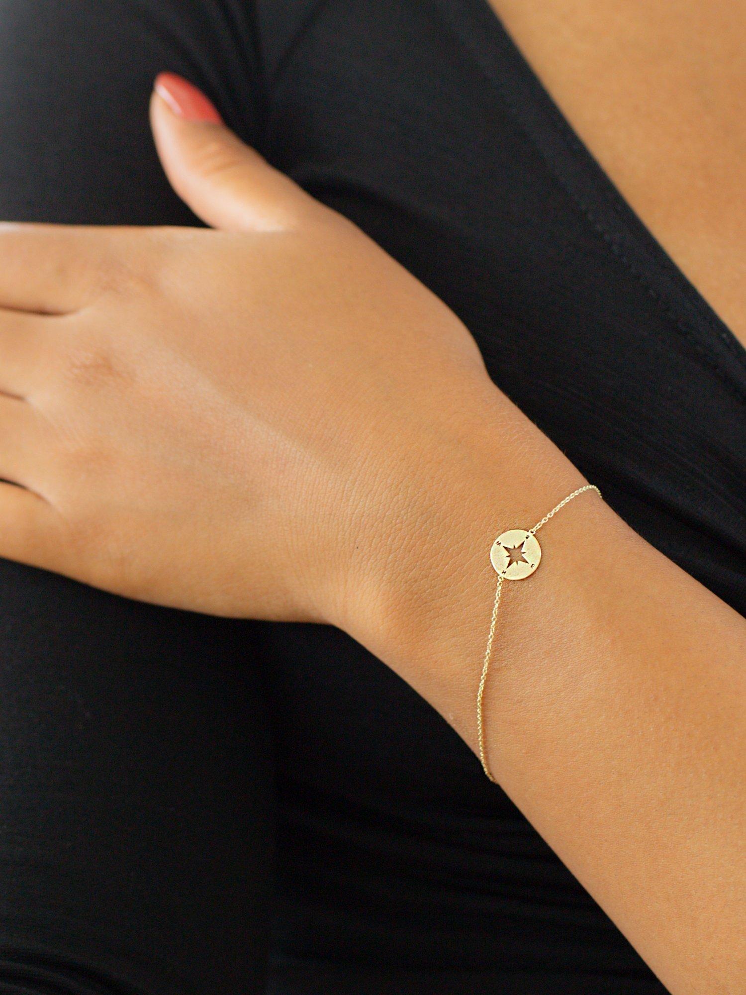 IBB 9ct yellow gold compass charm bracelet (British brand)