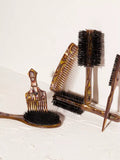 Oribe flat hair brush with Italian resin handle, imported from the UK