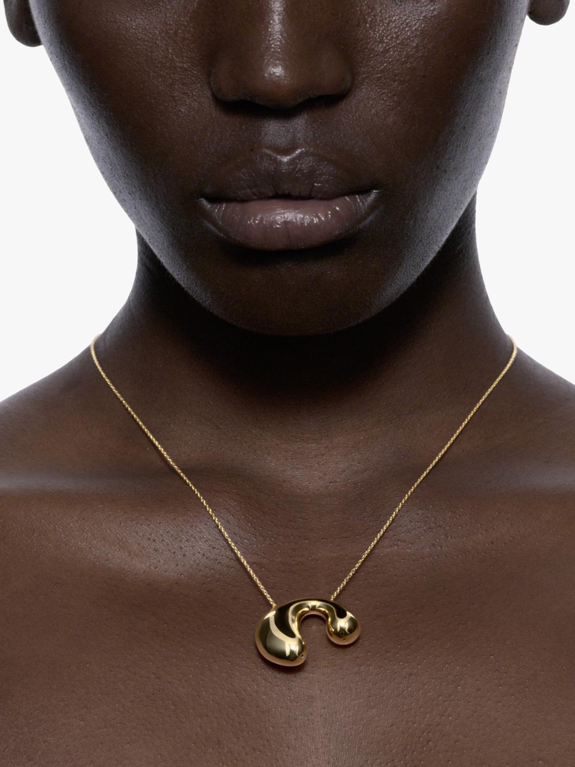 Maria Black biomorphic pendant necklace gold plated 18 carat, imported from the UK