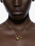 Maria Black biomorphic pendant necklace gold plated 18 carat, imported from the UK