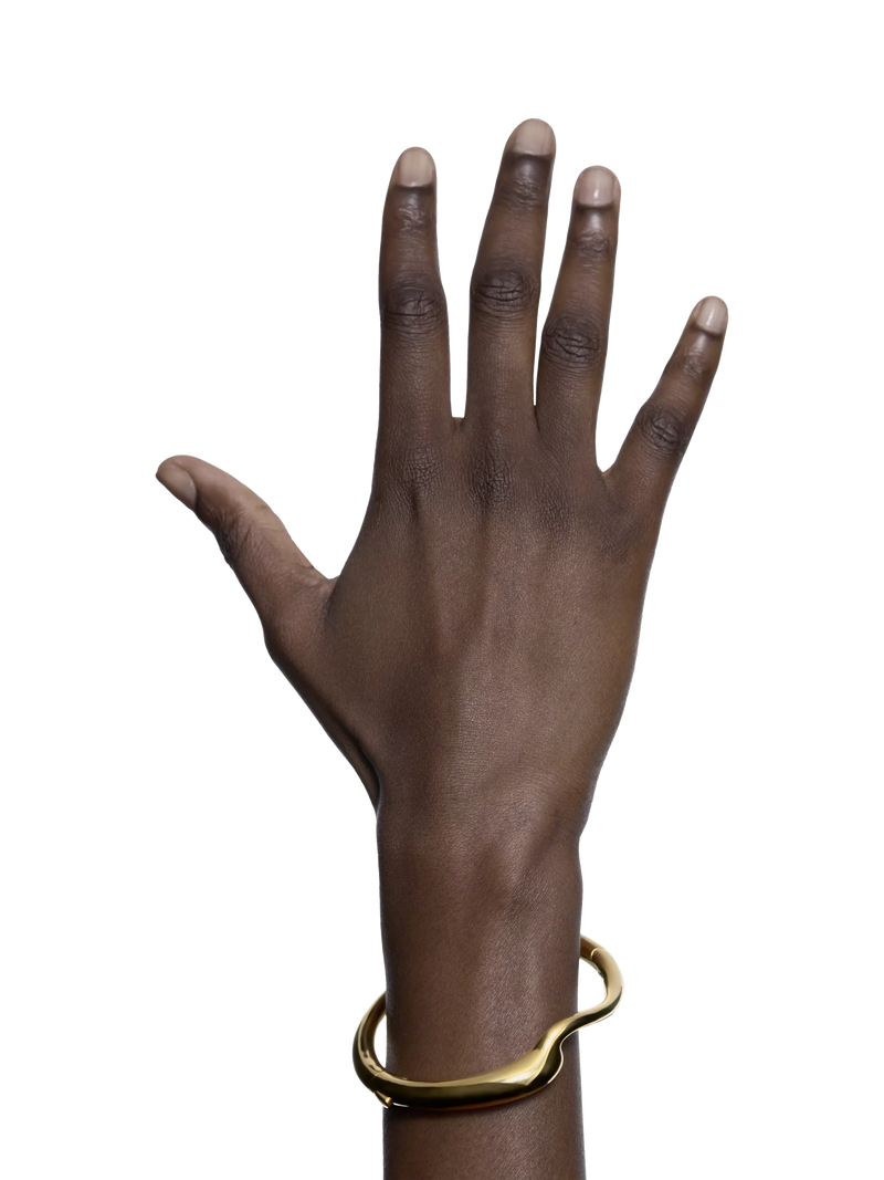 Maria Black gold curved splash bangle (British brand)