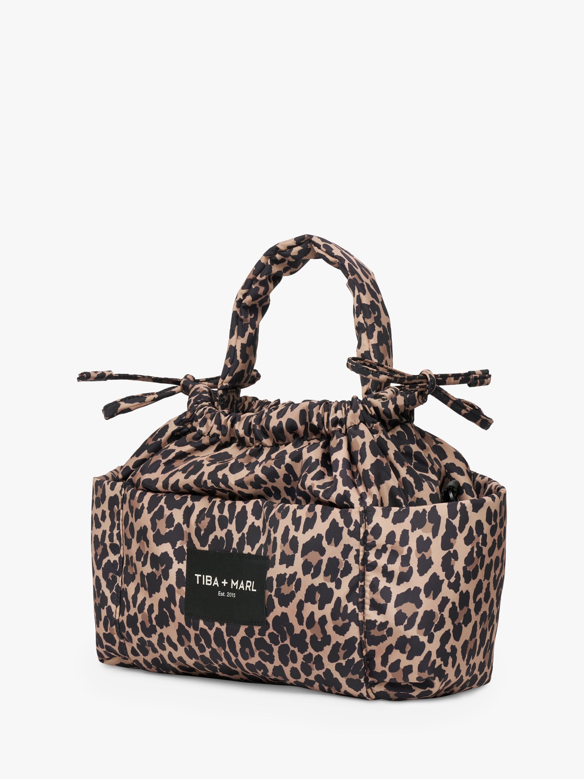 Tiba+Marl mini changing bag leopard print, imported from the UK