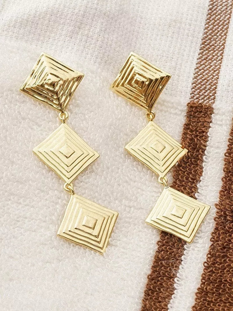 Daisy London gold drop earrings, imported from the UK