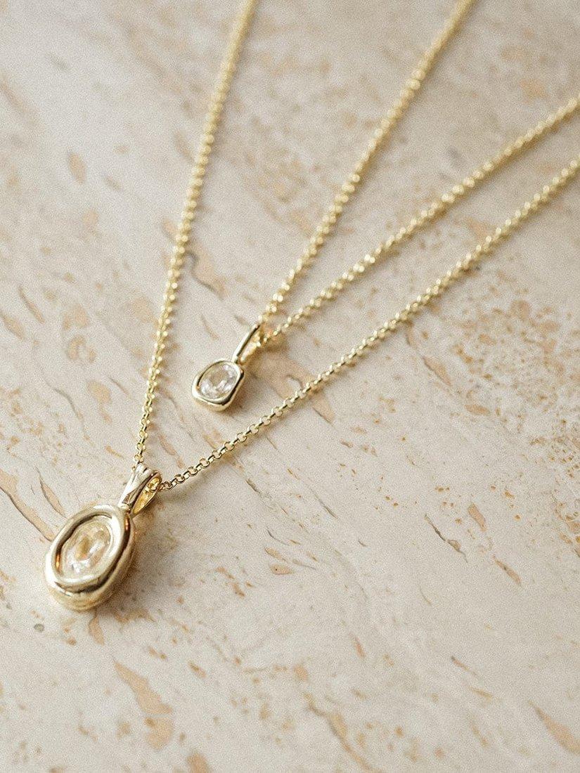 Daisy London gold locket necklace, lab-grown sapphire (British brand)