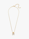 Eclectica pre-loved gold pendant necklace with glass stone, imported from the UK
