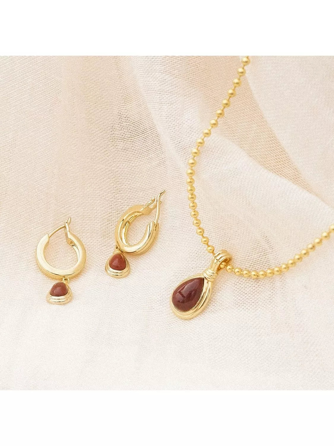 Daisy London 18ct gold plated red jasper hoop earrings, imported from the UK