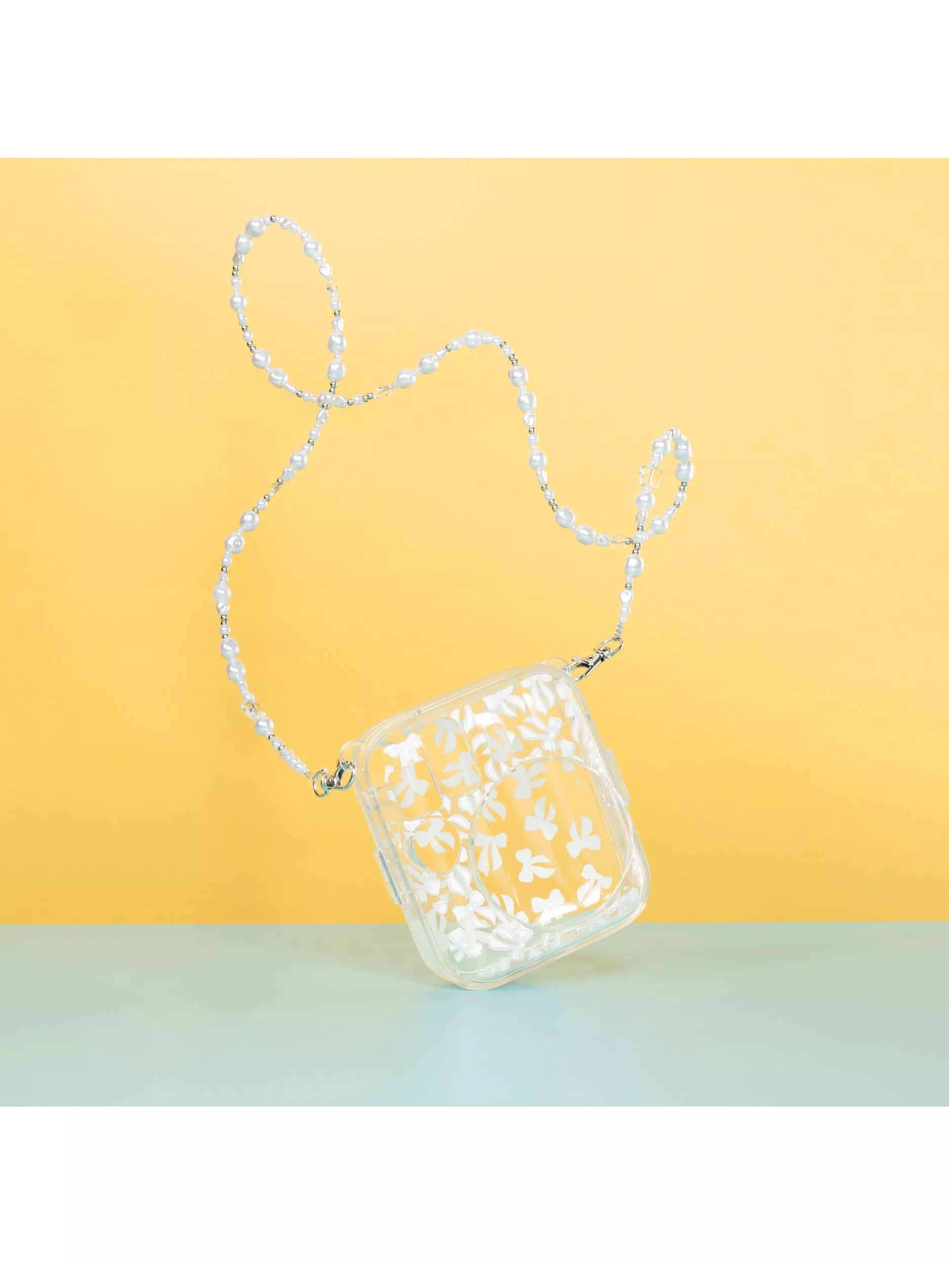instax Skinnydip Bow clear camera case (British brand)