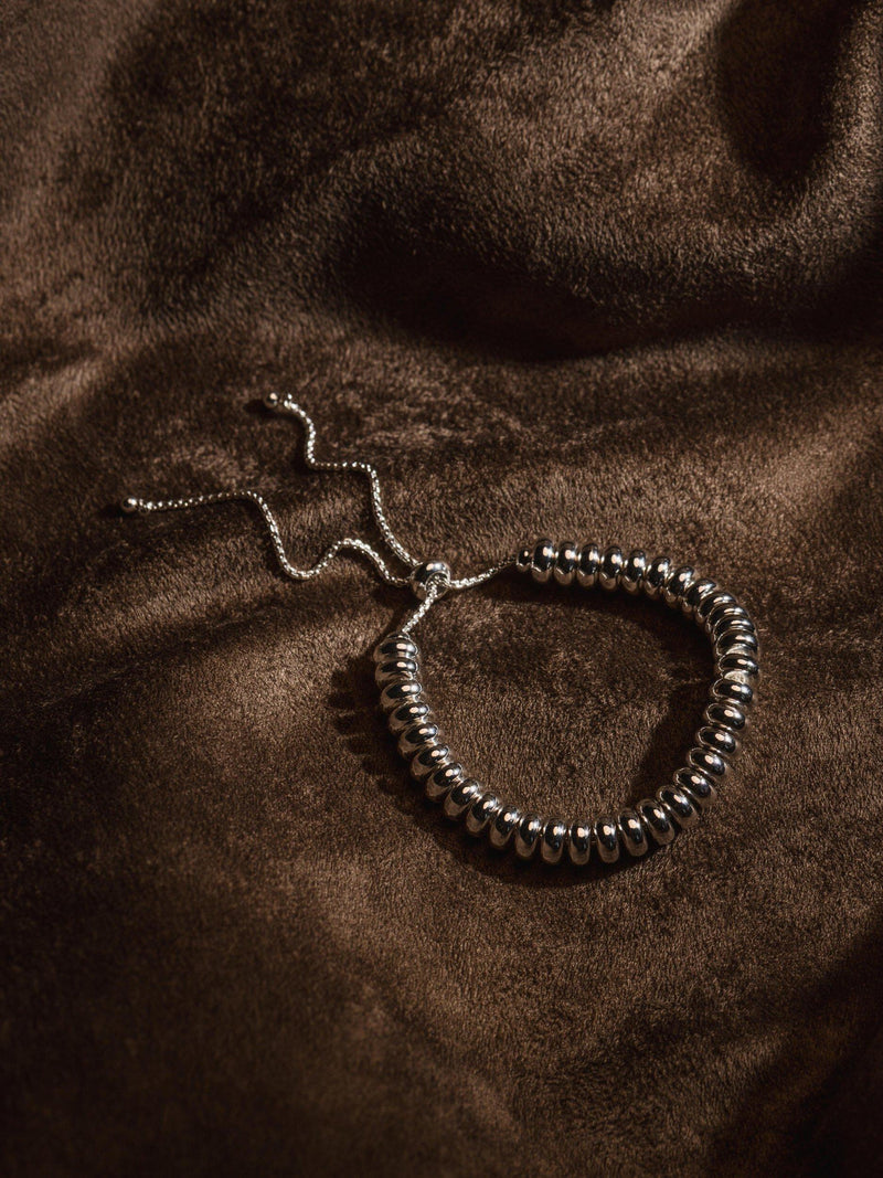Orelia metal nugget adjustable slider bracelet 28cm, UK version