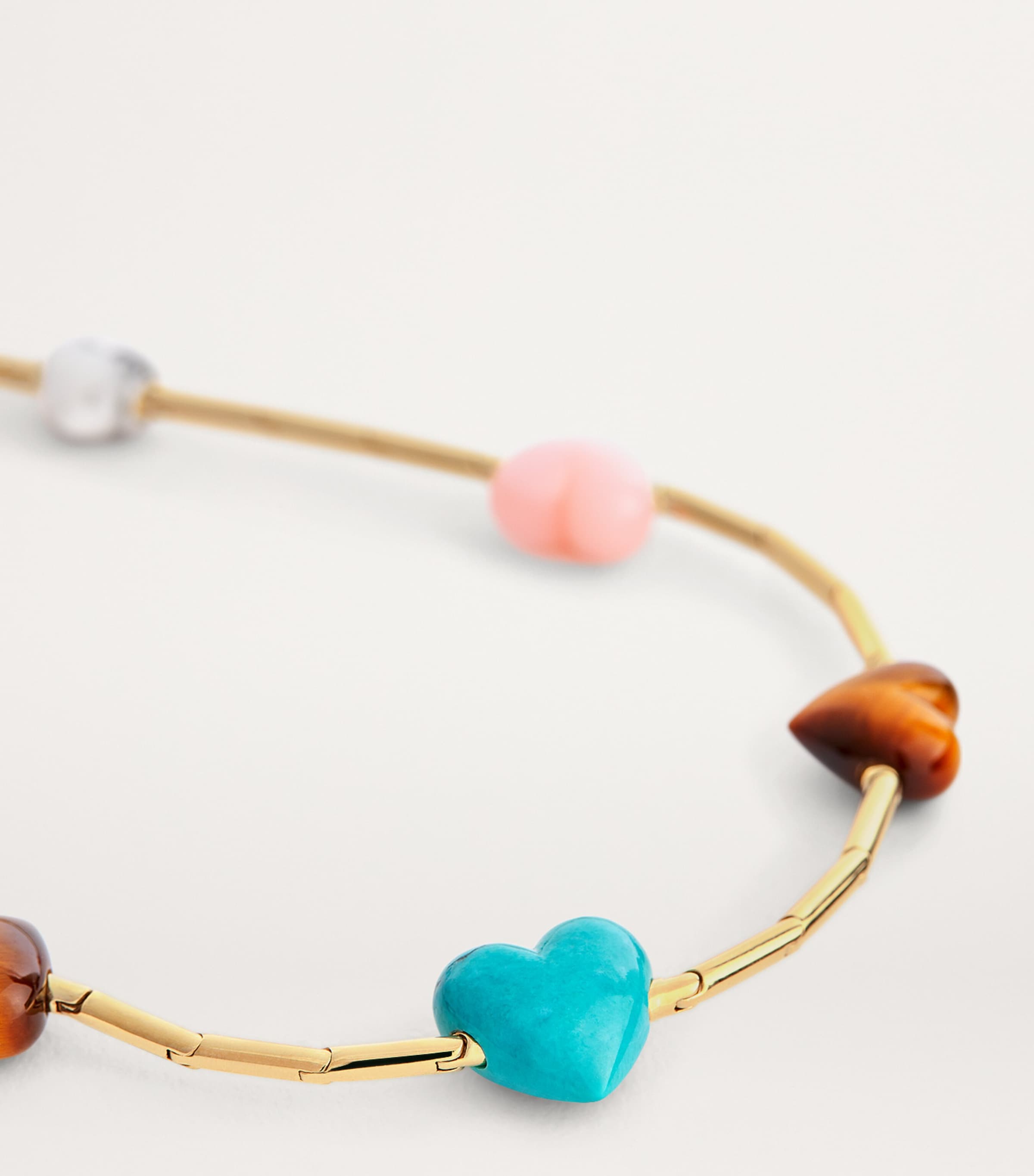 Emily P. Wheeler yellow gold necklace with gemstone hearts, imported from the UK