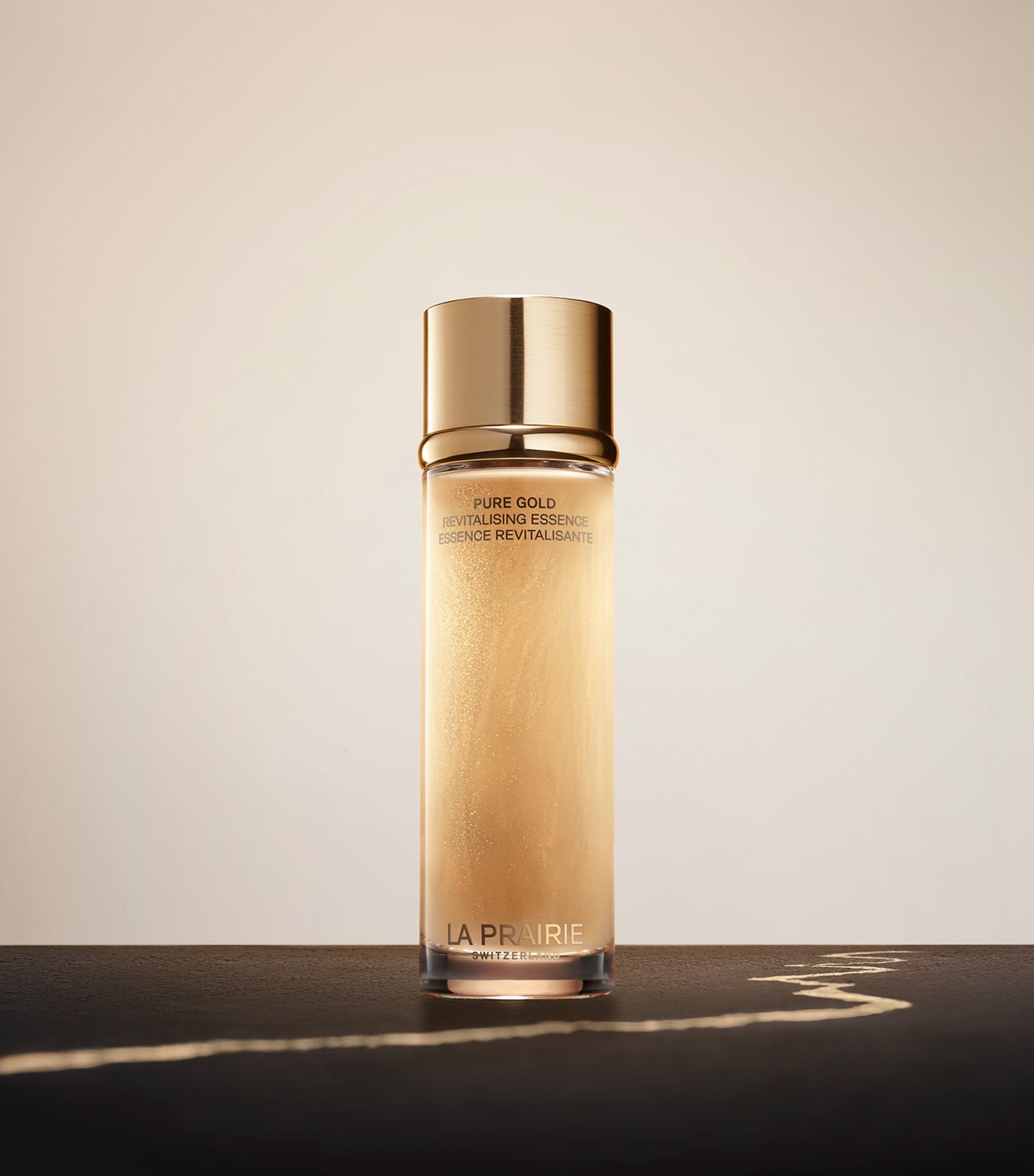 La Prairie Pure Gold Revitalising Essence 130ml, imported from the UK
