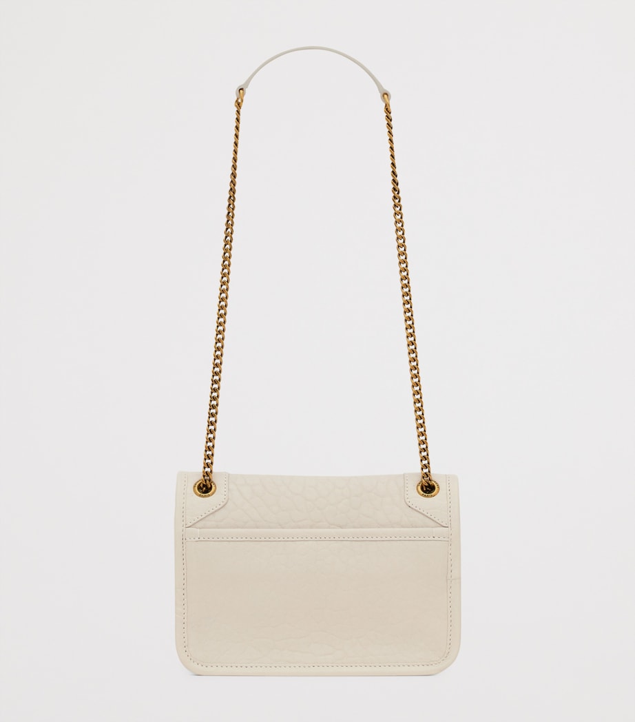 Saint Laurent Mini Niki shoulder bag in leather, imported from the UK