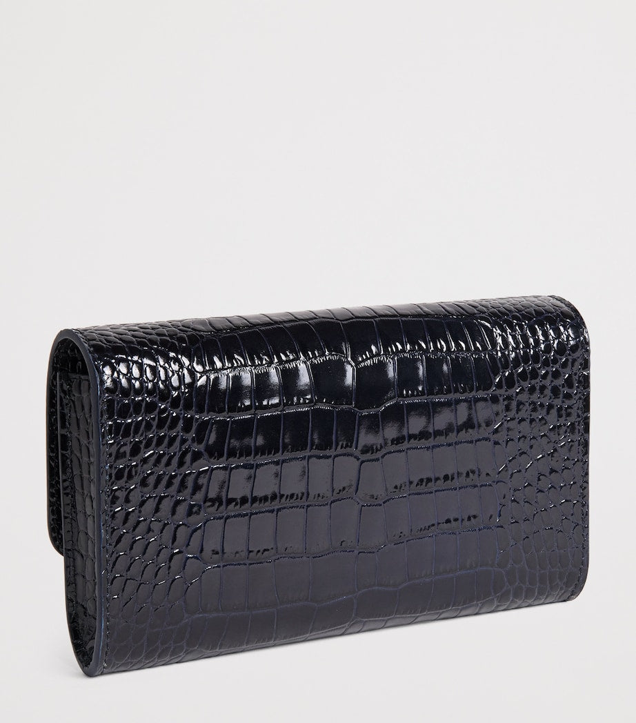 Jeffrey Levinson croc-embossed leather clutch bag, UK version