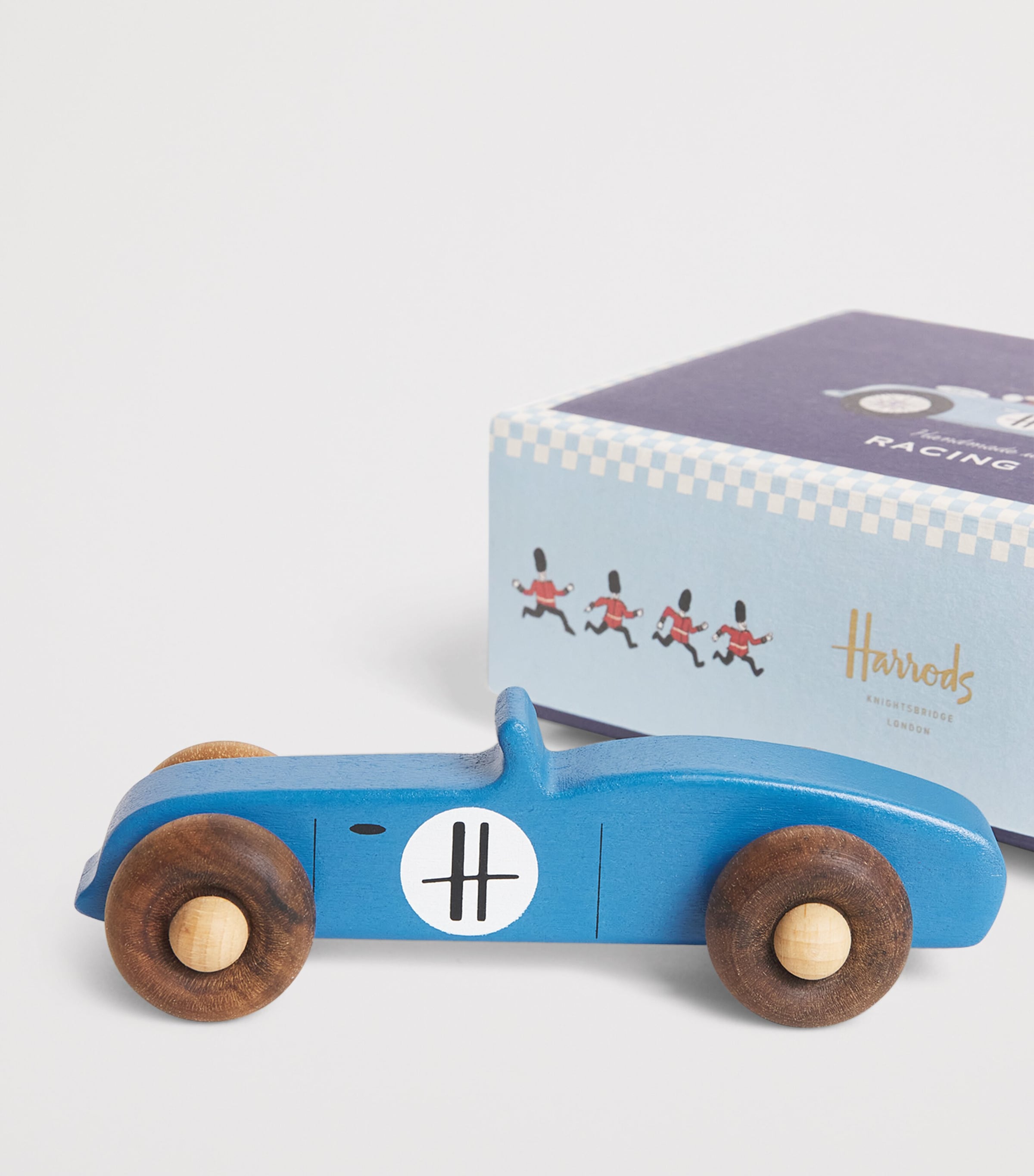 Harrods vintage-style wooden racing car toy with spinning wheels, UK version