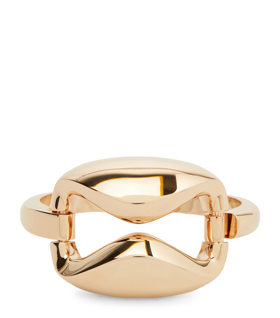Max Mara oversized geometric bracelet in bronze, UK version