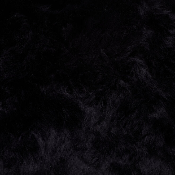 Coussin Bowron noir en peau de mouton 35x35cm, version UK