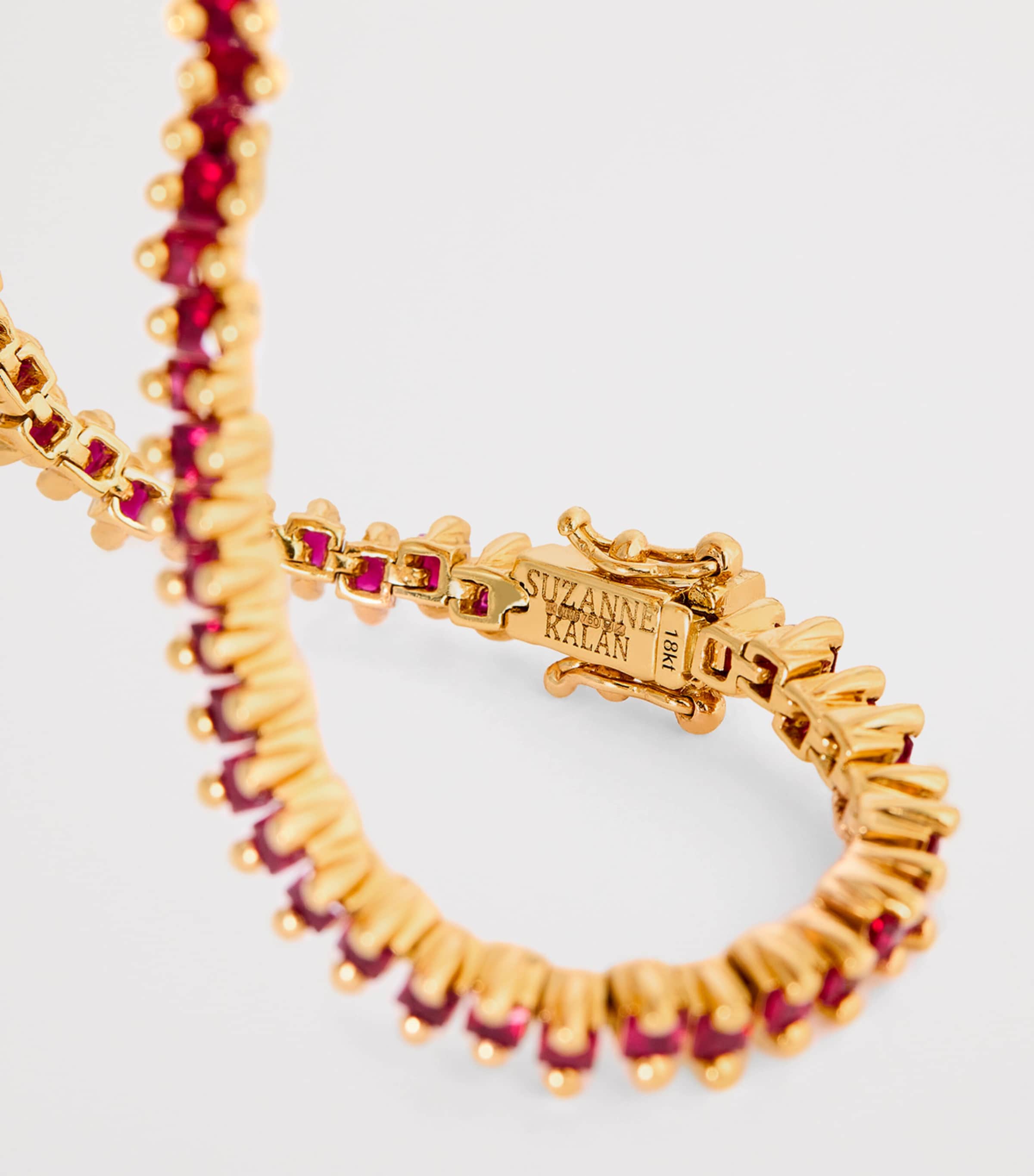 Suzanne Kalan yellow gold and ruby tennis bracelet, imported from the UK