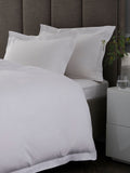White cotton-rich oxford duvet cover and pillowcase set (British brand)