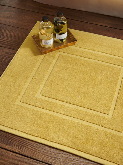 Next Christy Saffron Yellow Brixton 850GSM 100% Cotton Bath Mat- Buy online at McGrocer