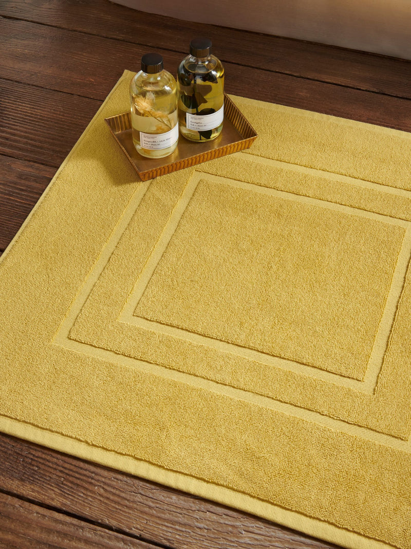 Christy Saffron Yellow Brixton bath mat 60x60cm (British brand)