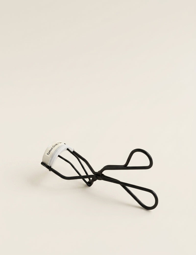 Hermès metal eyelash curler with replaceable pads (British brand)