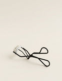 Hermès metal eyelash curler with replaceable pads (British brand)
