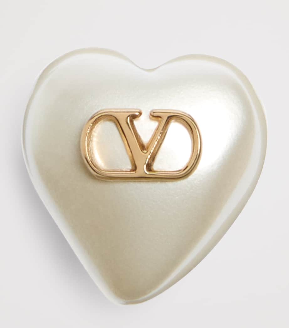 Valentino Garavani VLogo heart earrings in faux pearl and gold tone, imported from the UK