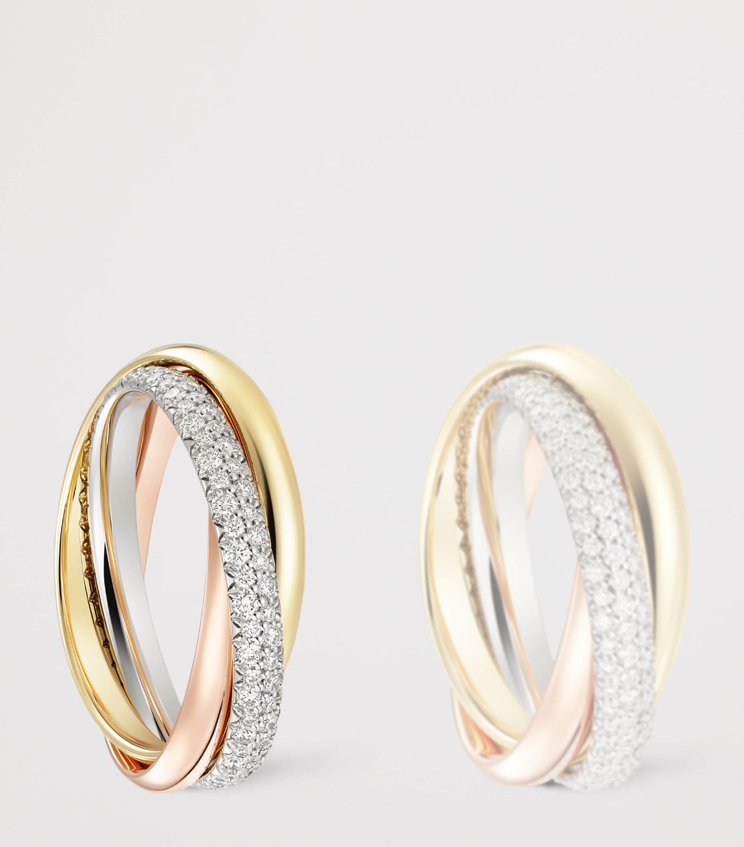 Cartier small Trinity ring three gold bands with pavé diamonds, imported from the UK