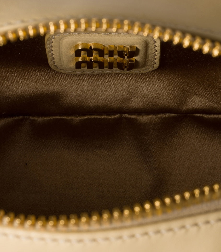 Miu Miu Arcadie matelassé leather top-handle bag, imported from the UK
