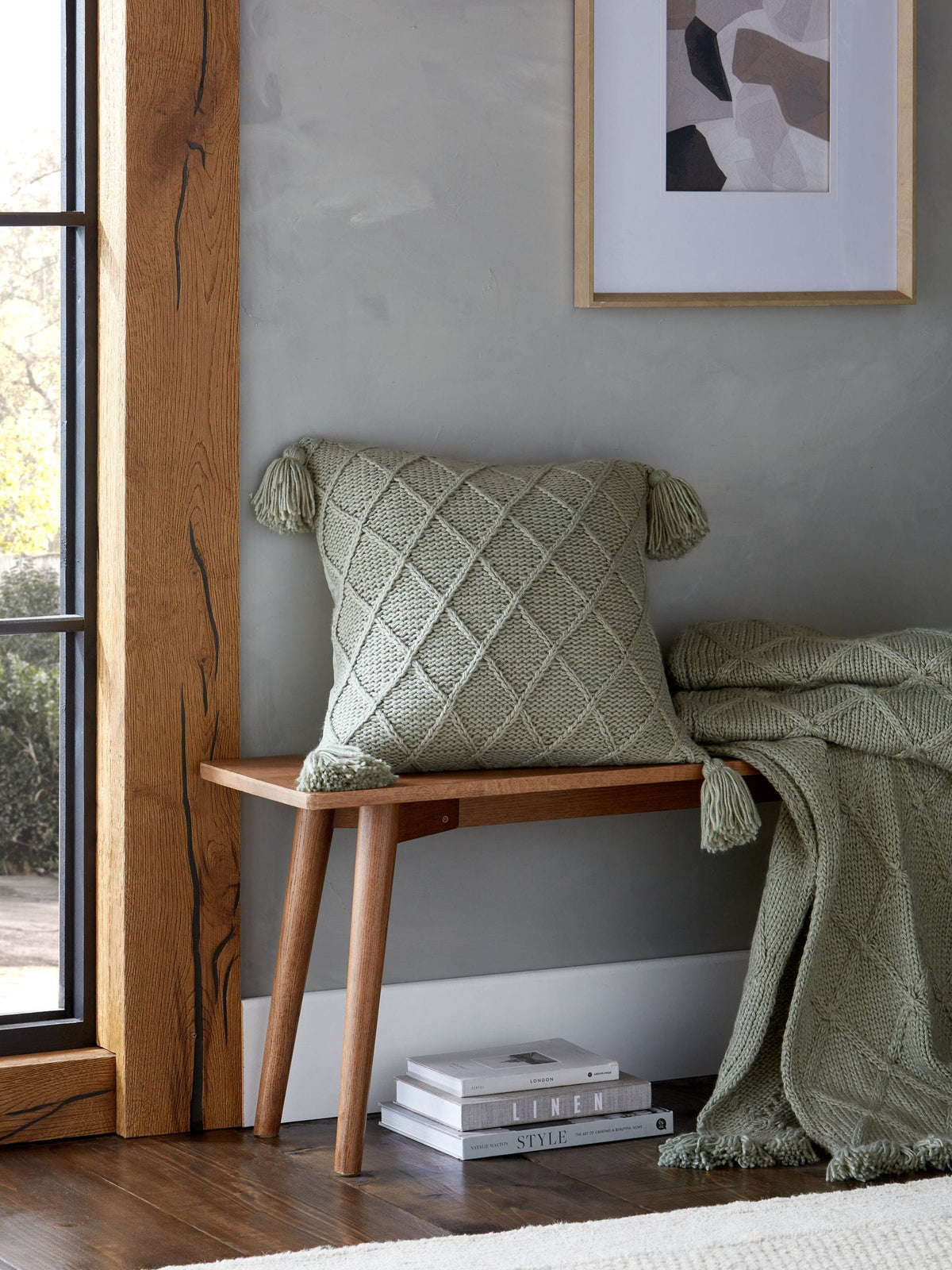 Sage green cushion with tassel trim 50x50cm (British brand)