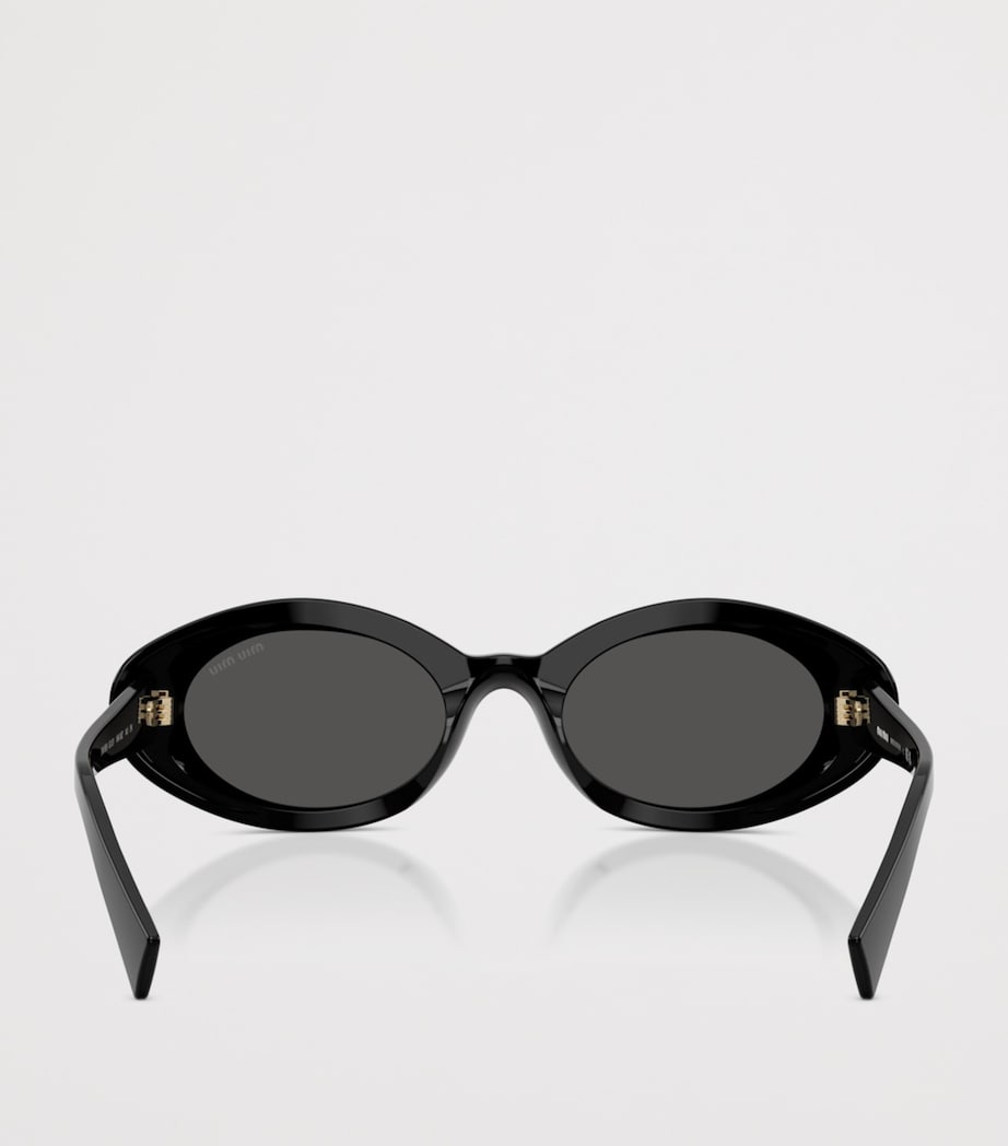 Miu Miu oval wrap-around sunglasses (British brand)