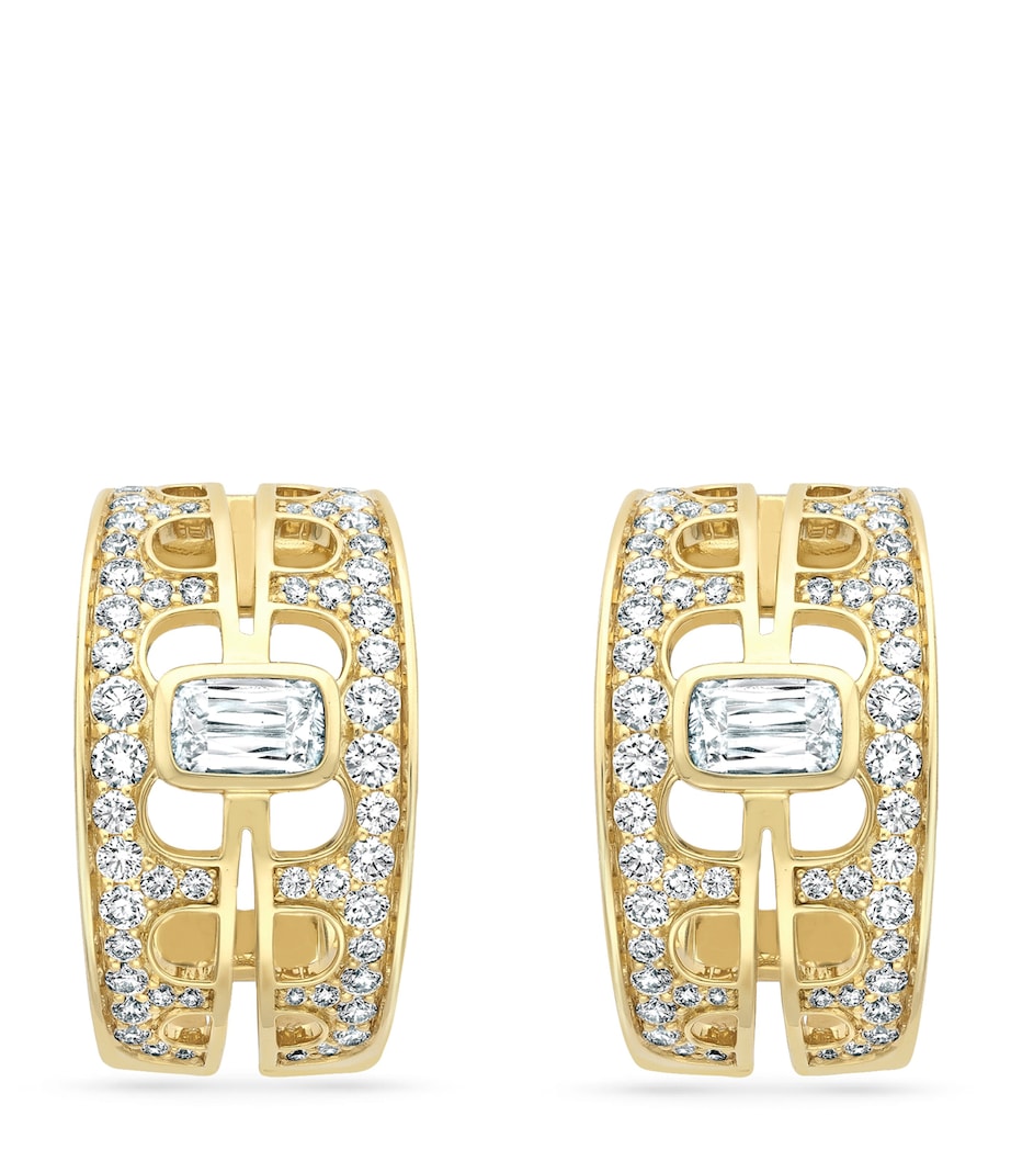 Boodles diamond and gold earrings, imported from the UK