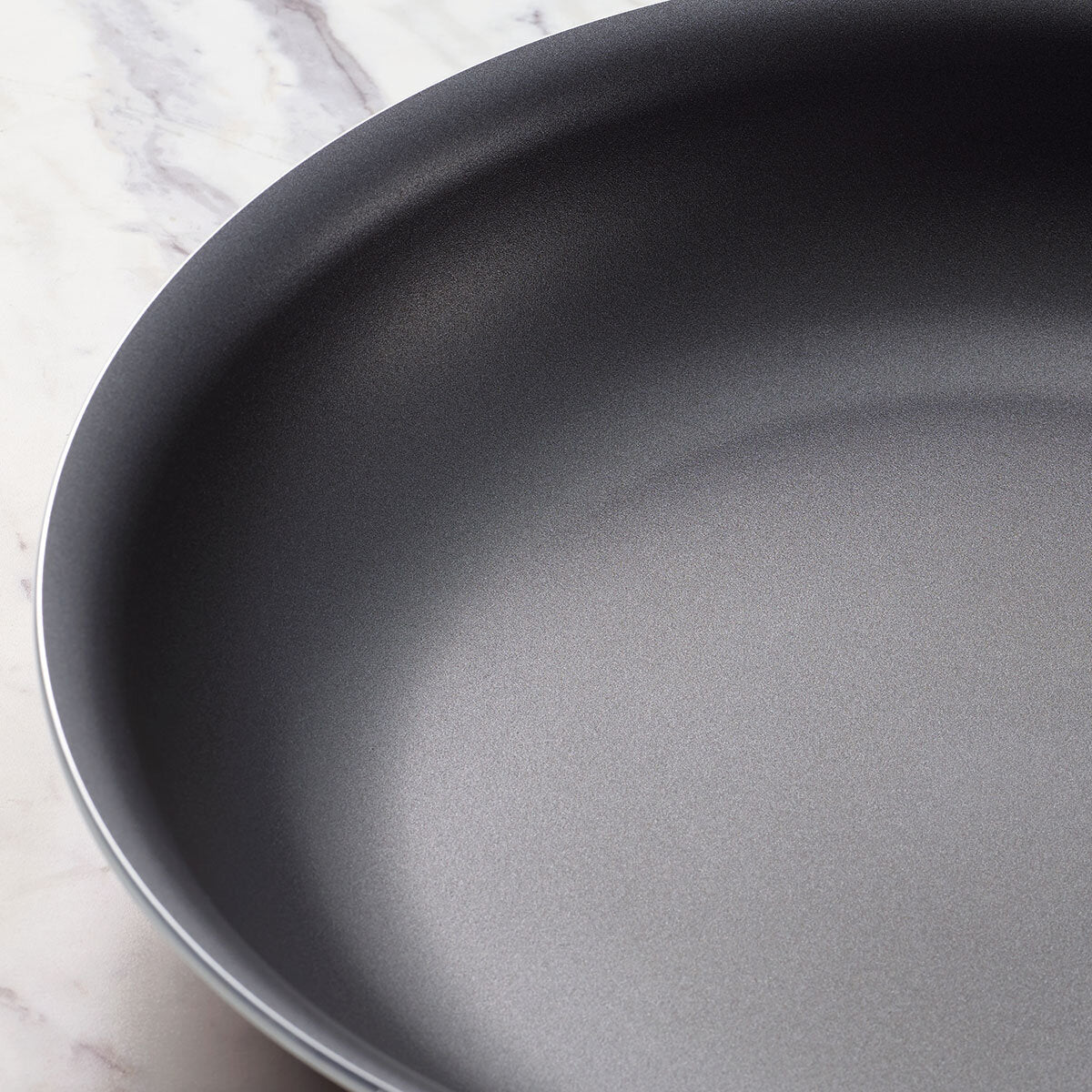 Tramontina 3-piece non-stick frying pan set in black and red, imported from the UK